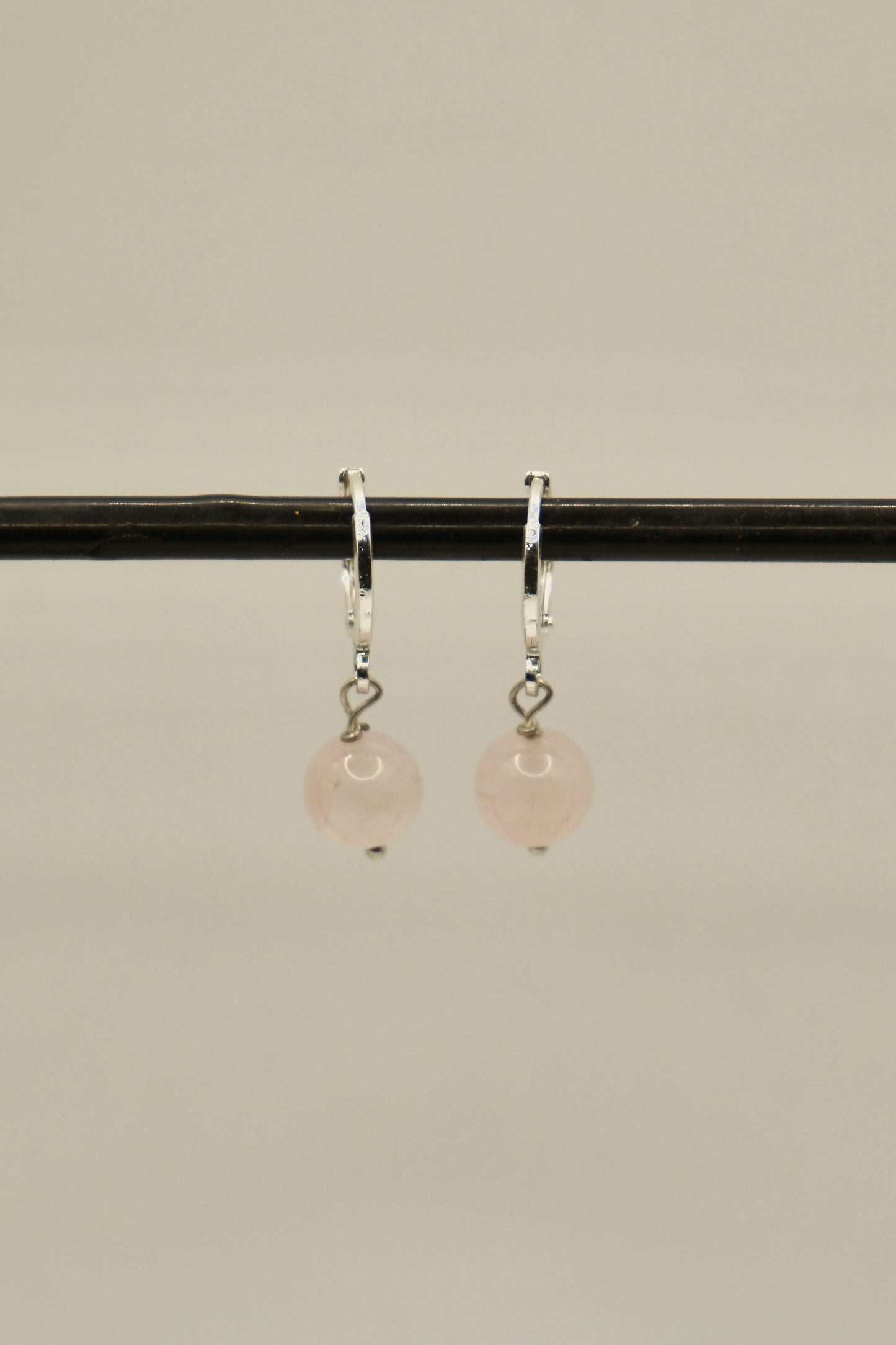 Sterling silver round rose quartz earrings